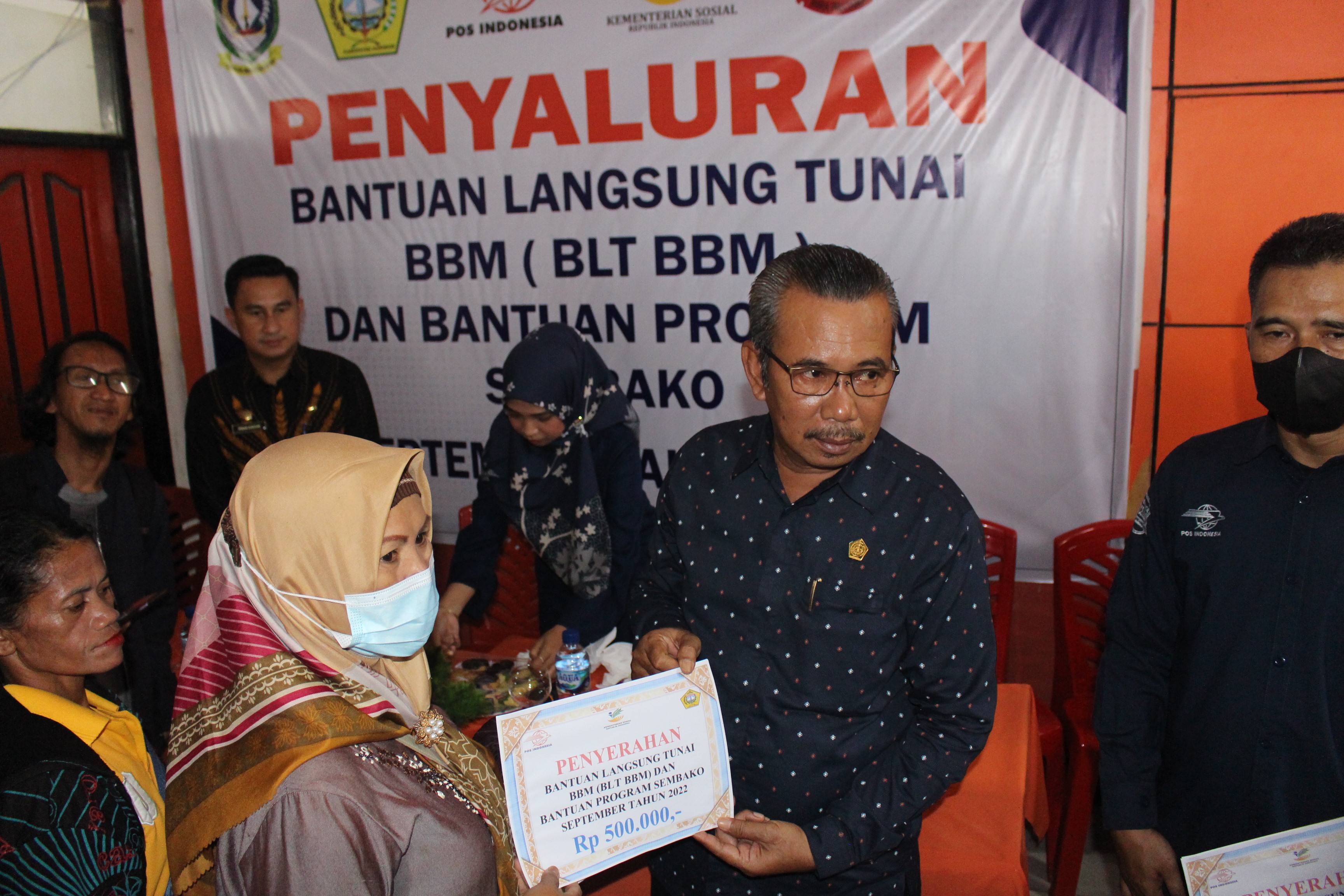 PENYALURAN BANTUAN LANGSUNG TUNAI BBM (BLT BBM) DAN BANTUAN PROGRAM SEMBAKO